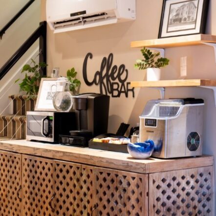 Coffee bar with machines and mugs