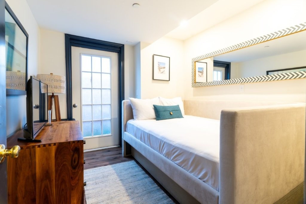 Room with open door to patio or balcony