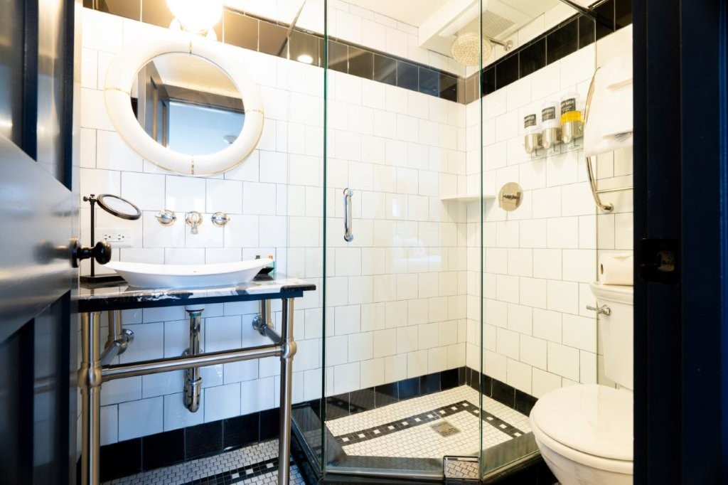 Bright bathroom with glass shower