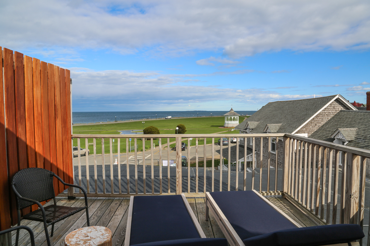 Balcony with lounge chairs and ocean view