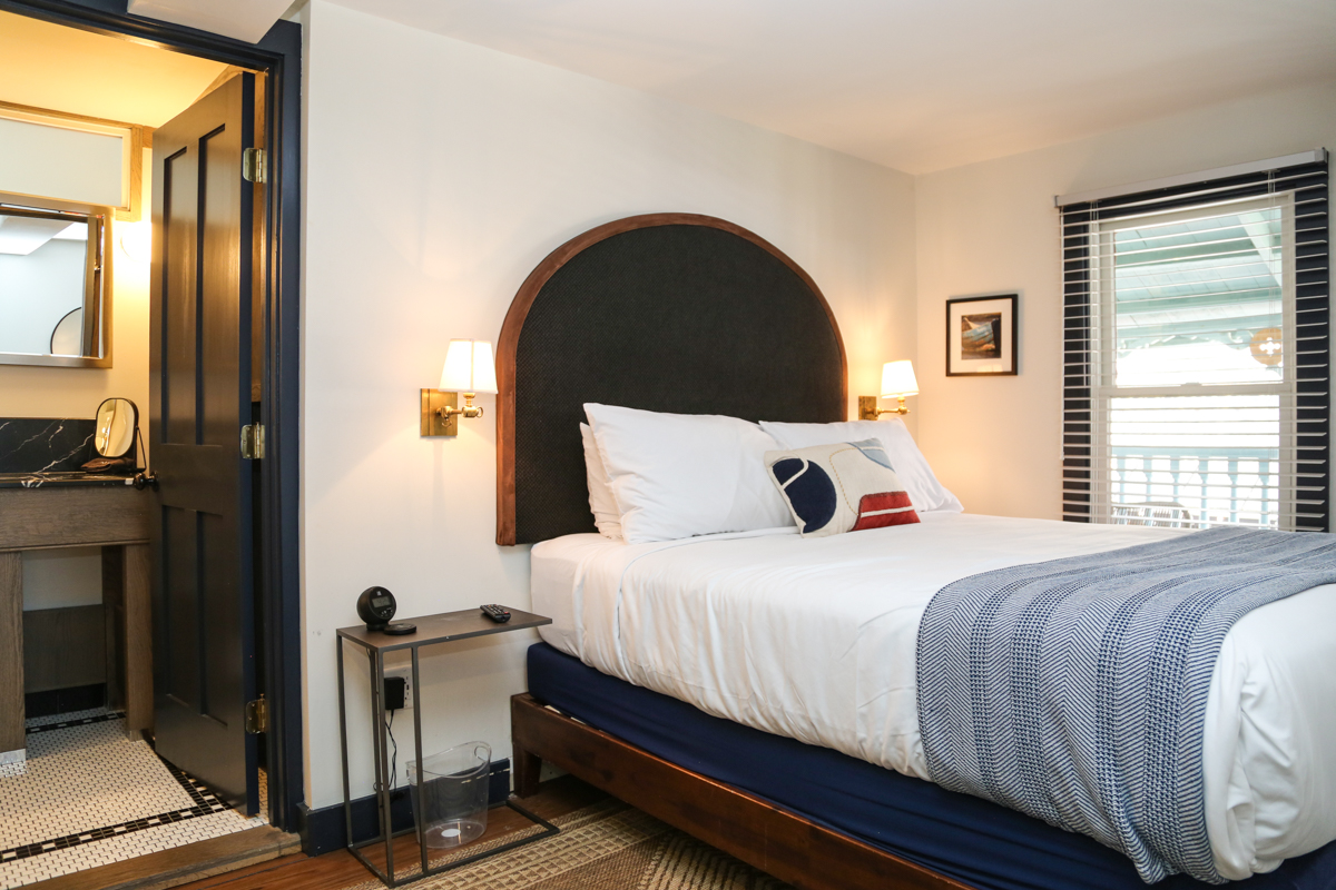 Guest room with open door and soft lighting